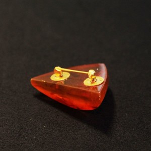 Vintage pressed triangle amber brooch